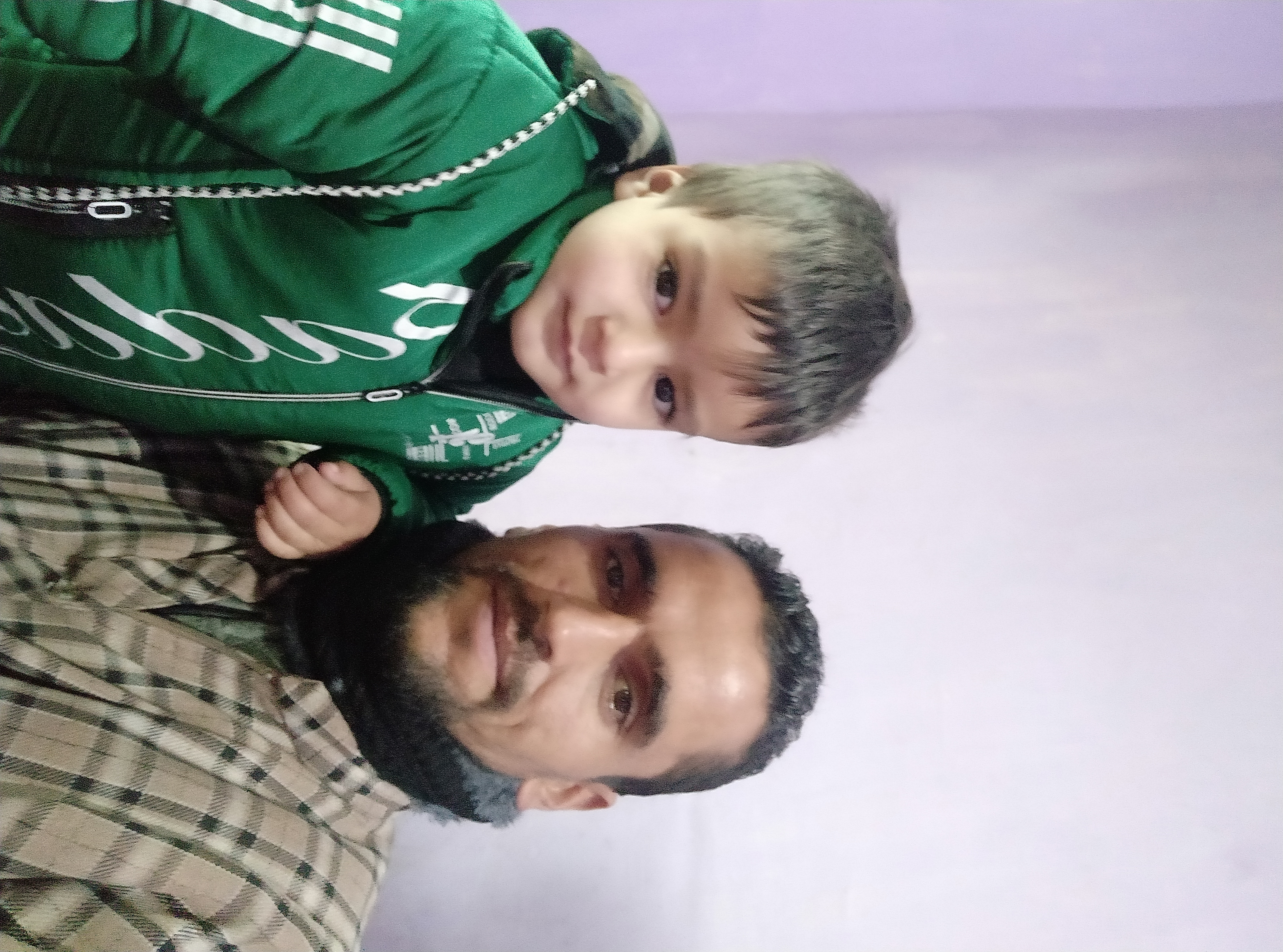 MUZAFFAR AHMAD SHEIKH