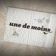 une de moins