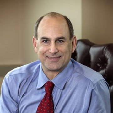 William Portuese, M.D.
