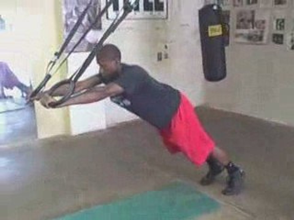 Ring Abdominal Rollout Exercise.