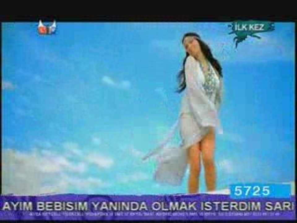 Tuğba Özerk - Bitter Çikolata-www.mp3cagi.com