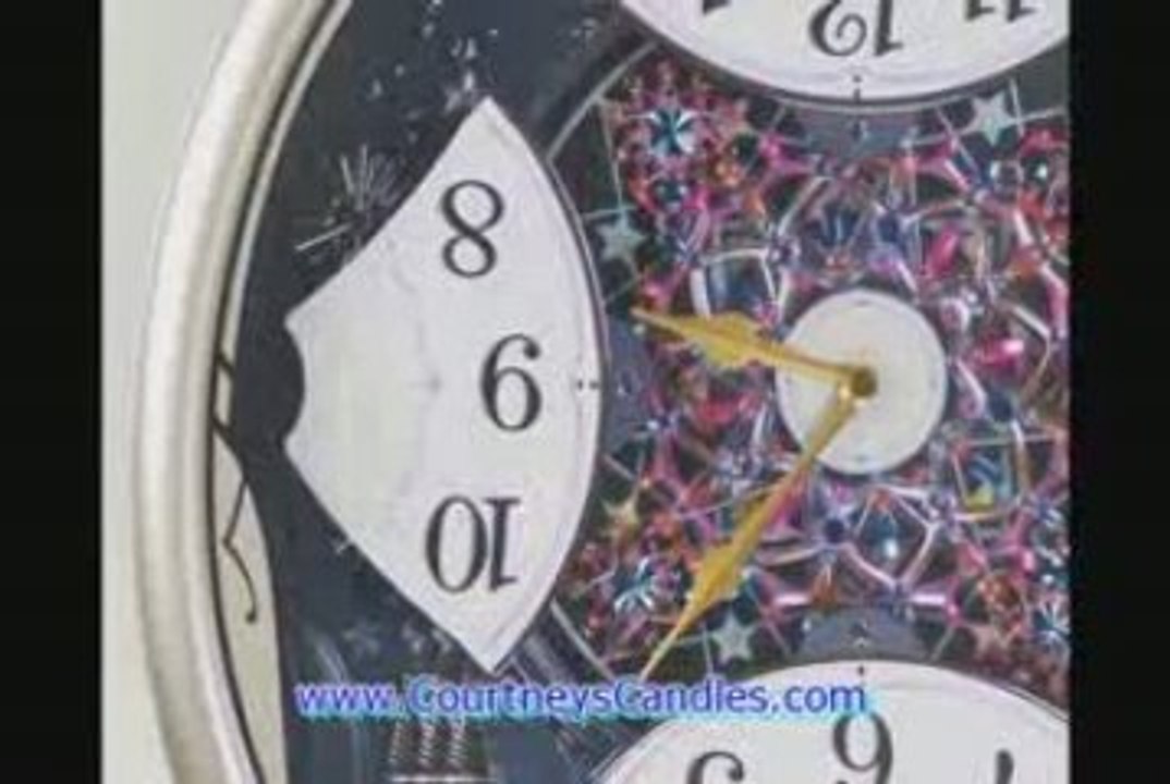 QXM239BRH SEIKO MELODIES IN MOTION MUSICAL CLOCK