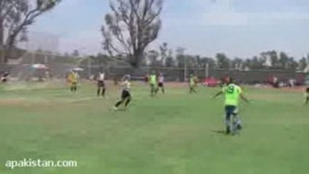 Little Girl Owned by Soccer Ball