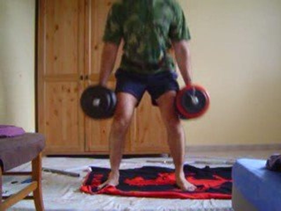 squat 32 kg dans chaque main