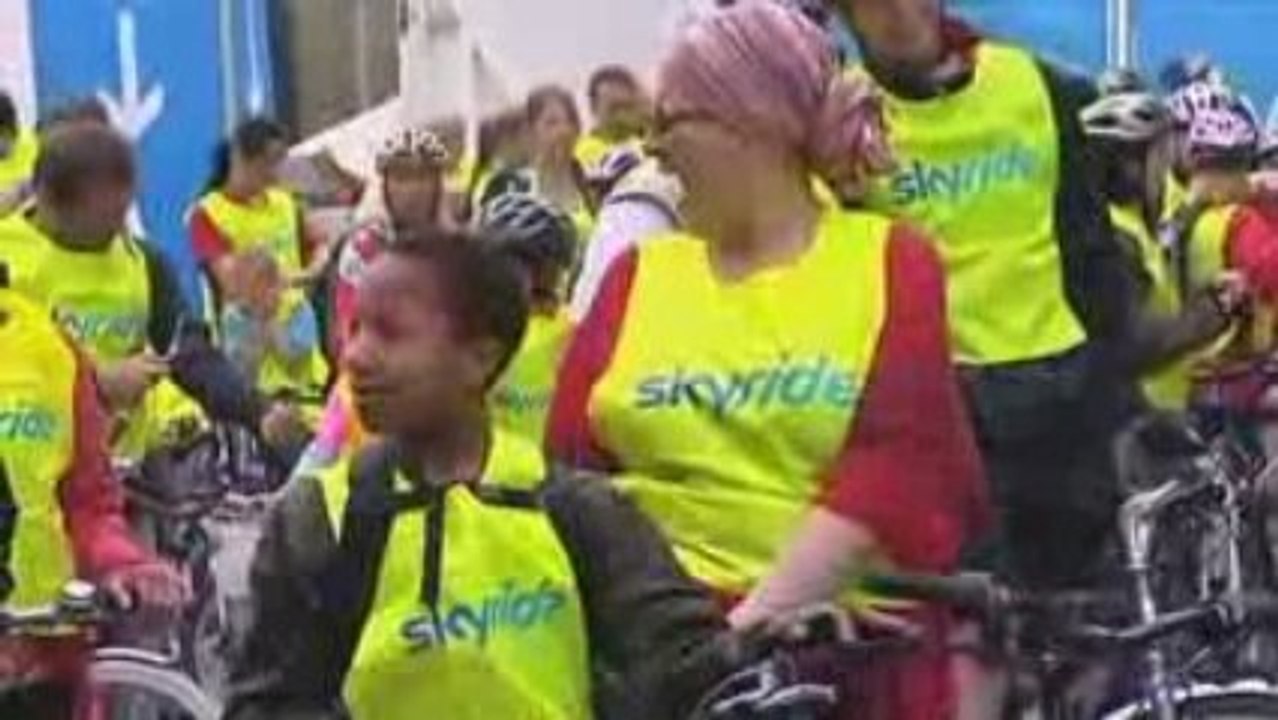 Skyride Manchester - Cycling in Stilts