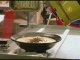 Un robot qui cuisine les nouilles d'un restaurant japonais