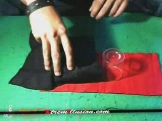 tour de magie : teleporter une piece www.xtremillusion.com