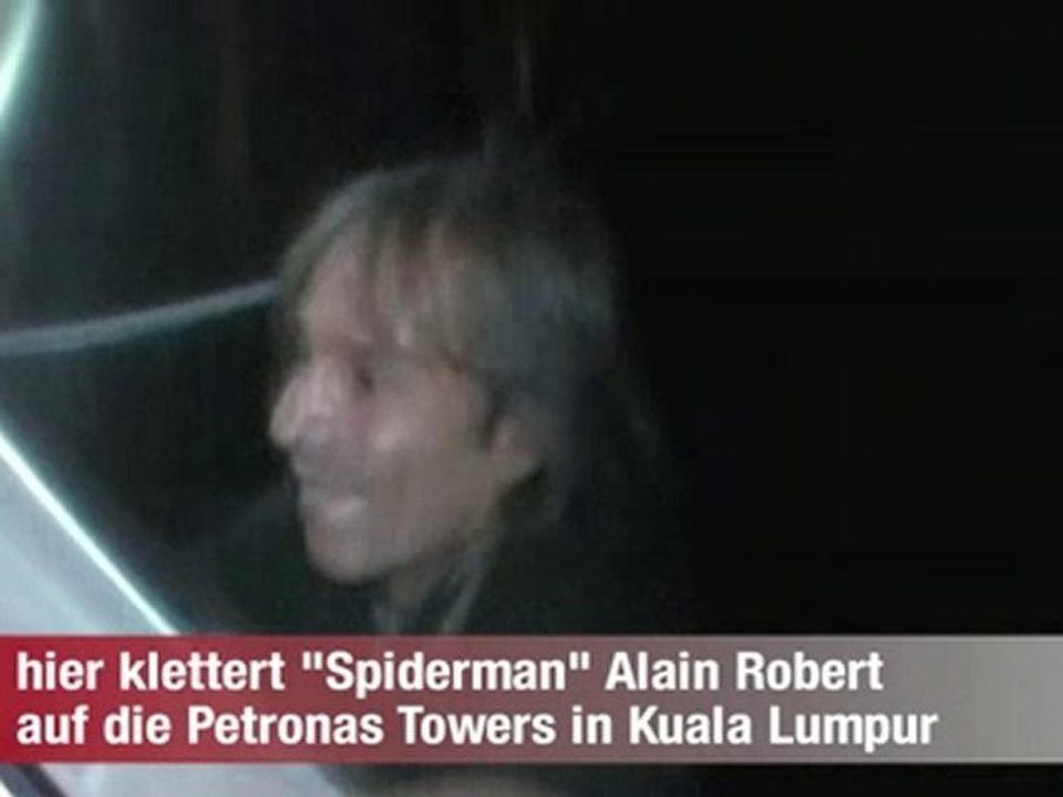 Alain ROBERT escalade la tour petronas