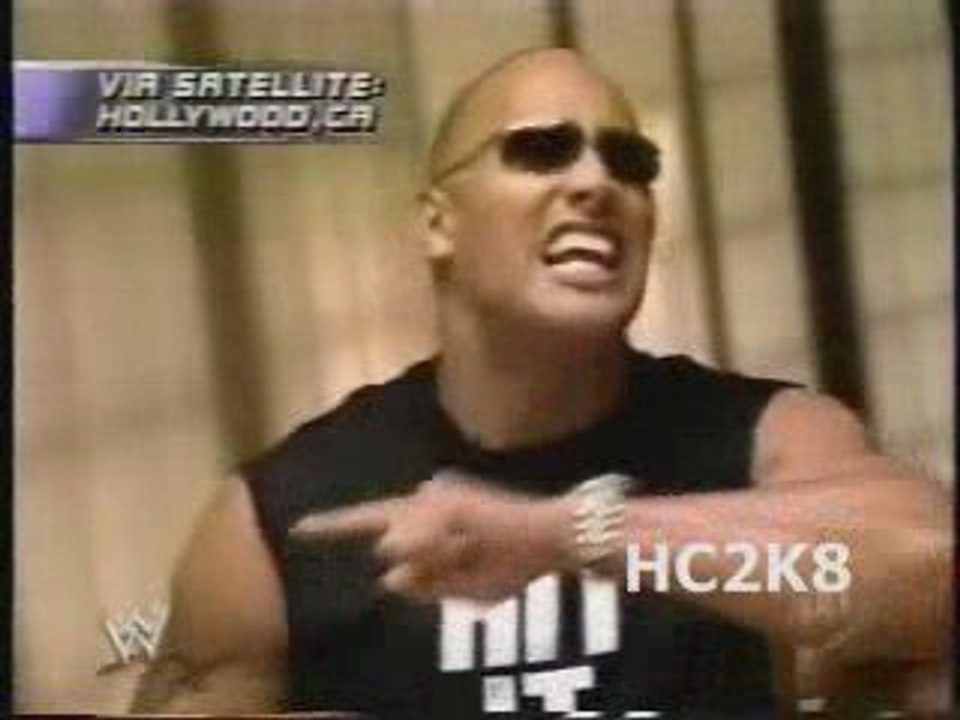 The Rock talks trash about the crowd and Hogan. video Dailymotion