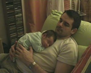 Minh Tam sleeping on dad