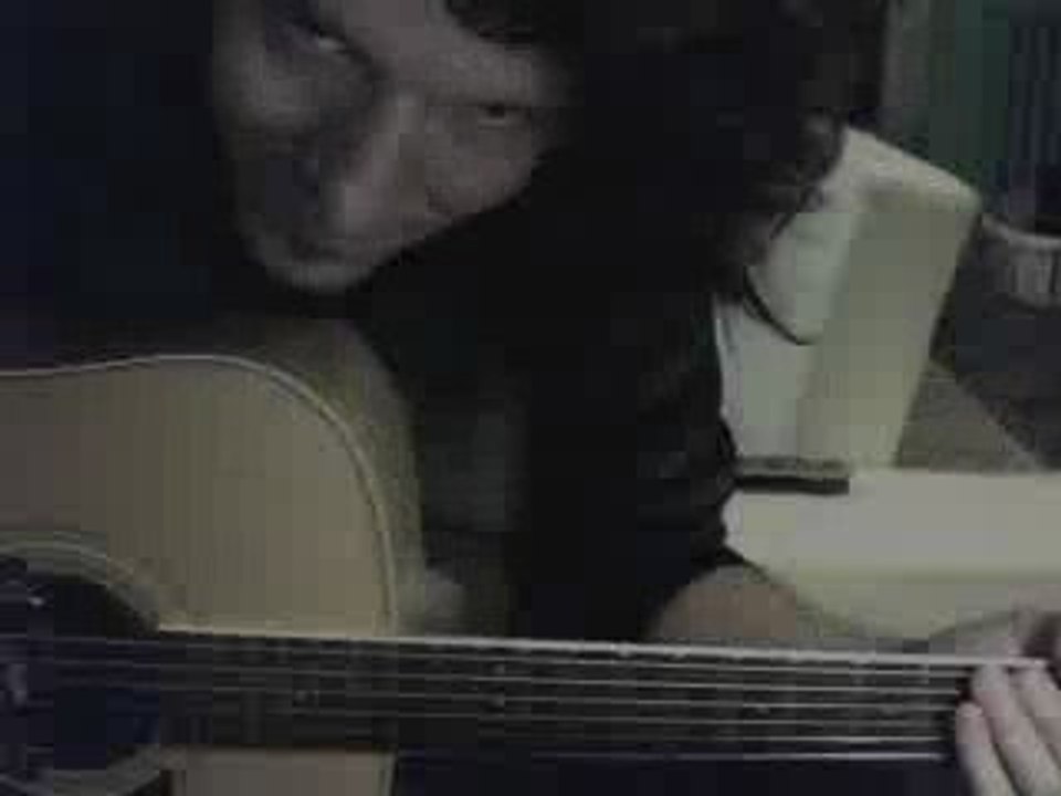 une impro sur un p'tit blues avec une guitare folk