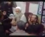 Iran a revolutionary guard slaps father of martyr