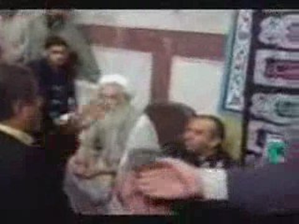 Iran a revolutionary guard slaps father of martyr Unknown