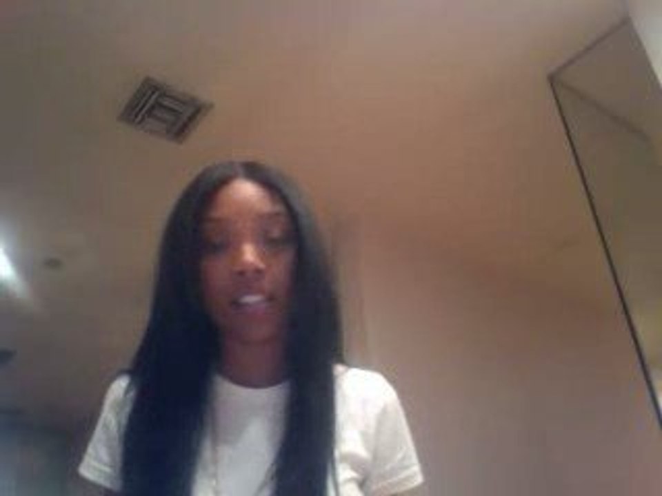 Brandy singin' "Somewhere Over the Rainbow" in her bathroom