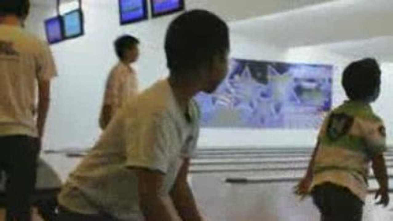 Boy bowling