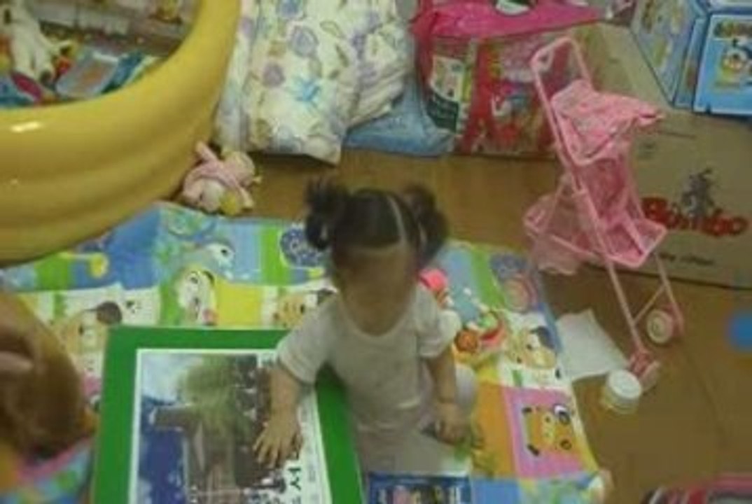 Baby Mideum laughing as Daddy & Uncle hit each other