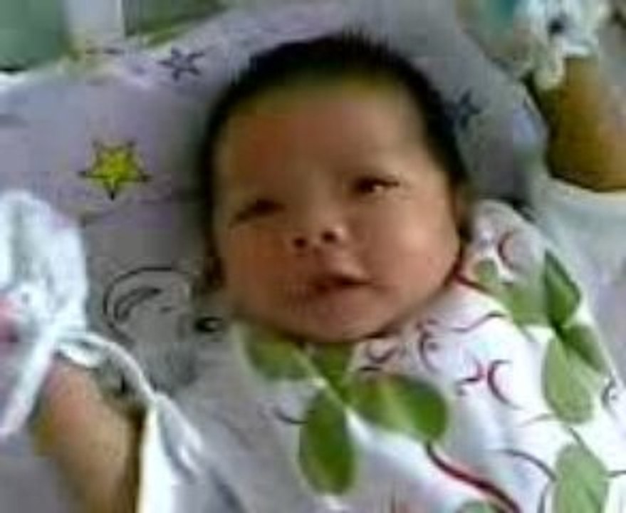 PinPin listens to music (16 days old)