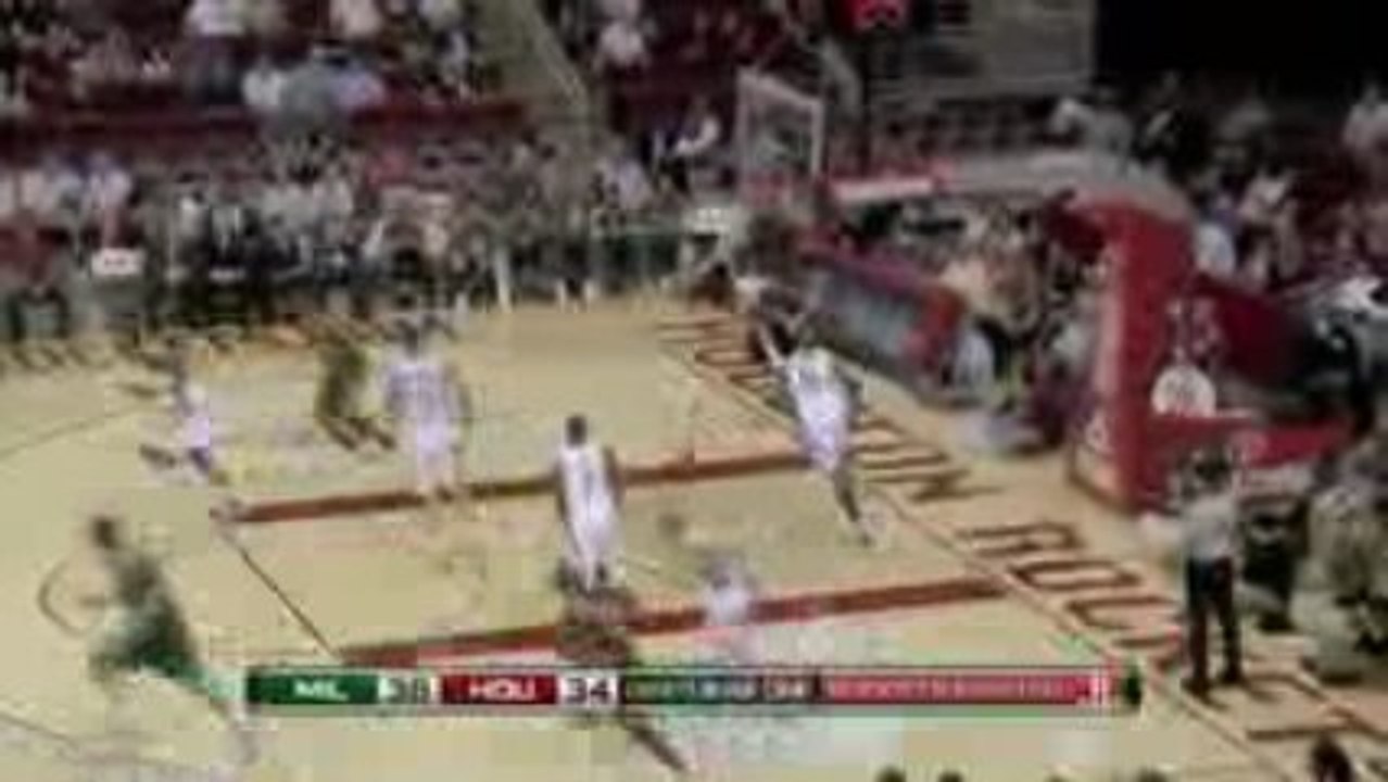 NBA Carlos Delfino hits Hakim Warren for the nice dunk.