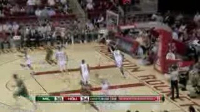 NBA Carlos Delfino hits Hakim Warren for the nice dunk.