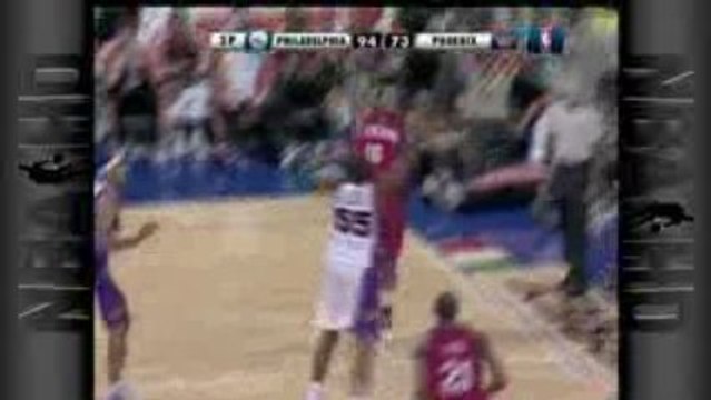 NBA Andre Iguodala throws a pass through the defenders legs