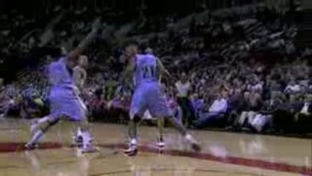 NBA Ime Udoka floats a pass to Martell Webster for the alley