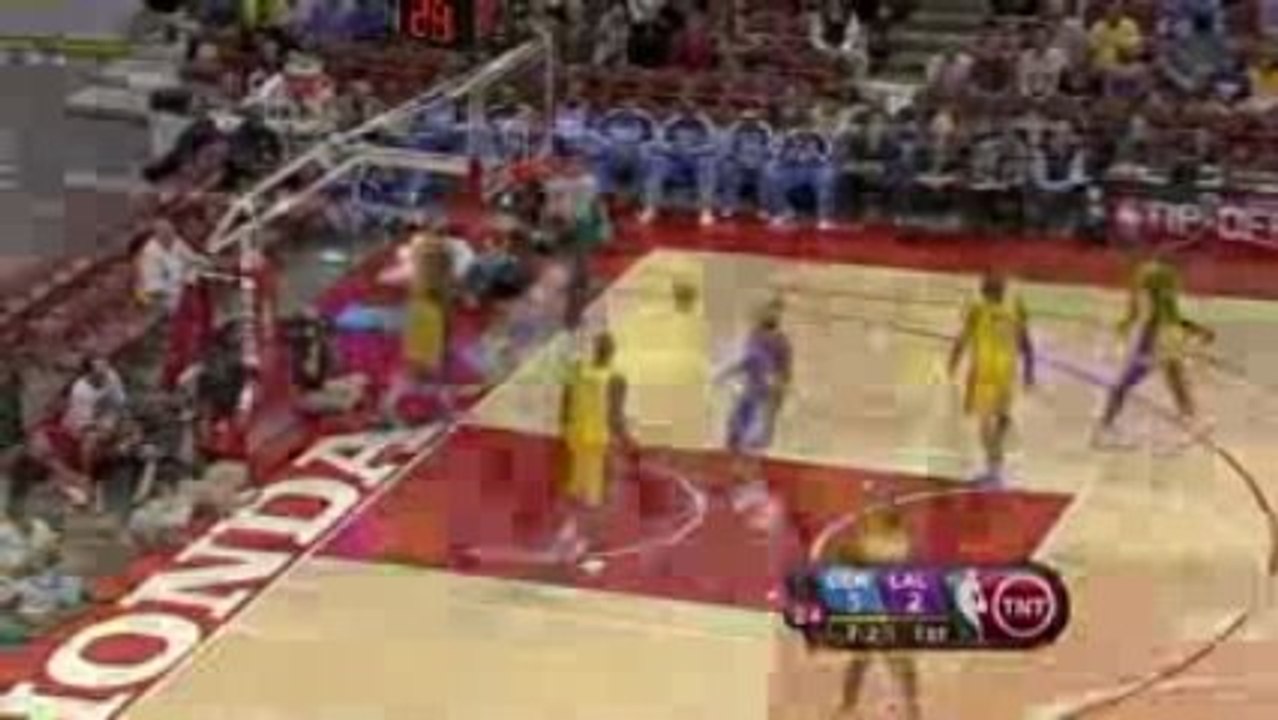 NBA Kenyon Martin flushes the two-hand dunk and taps the bac