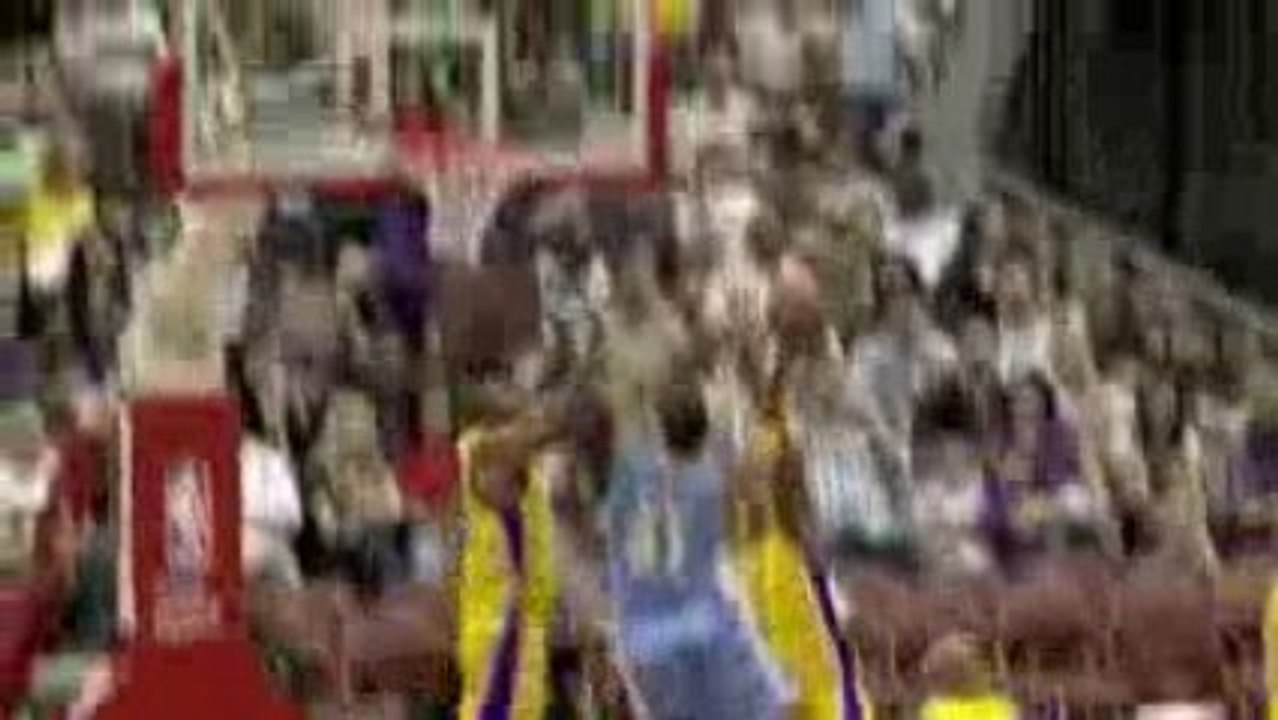 Nenê getting blocks By Didier Ilunga-Mbenga in the paint.