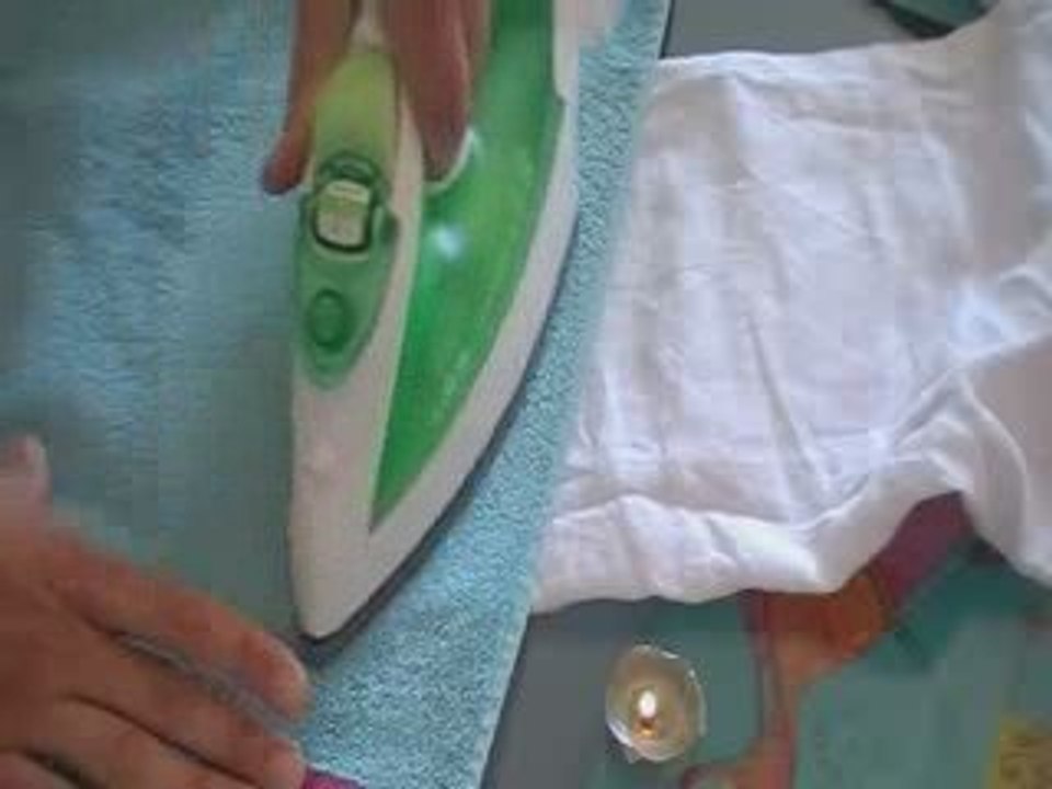 Comment enlever de la cire de bougie de sur les vêtements