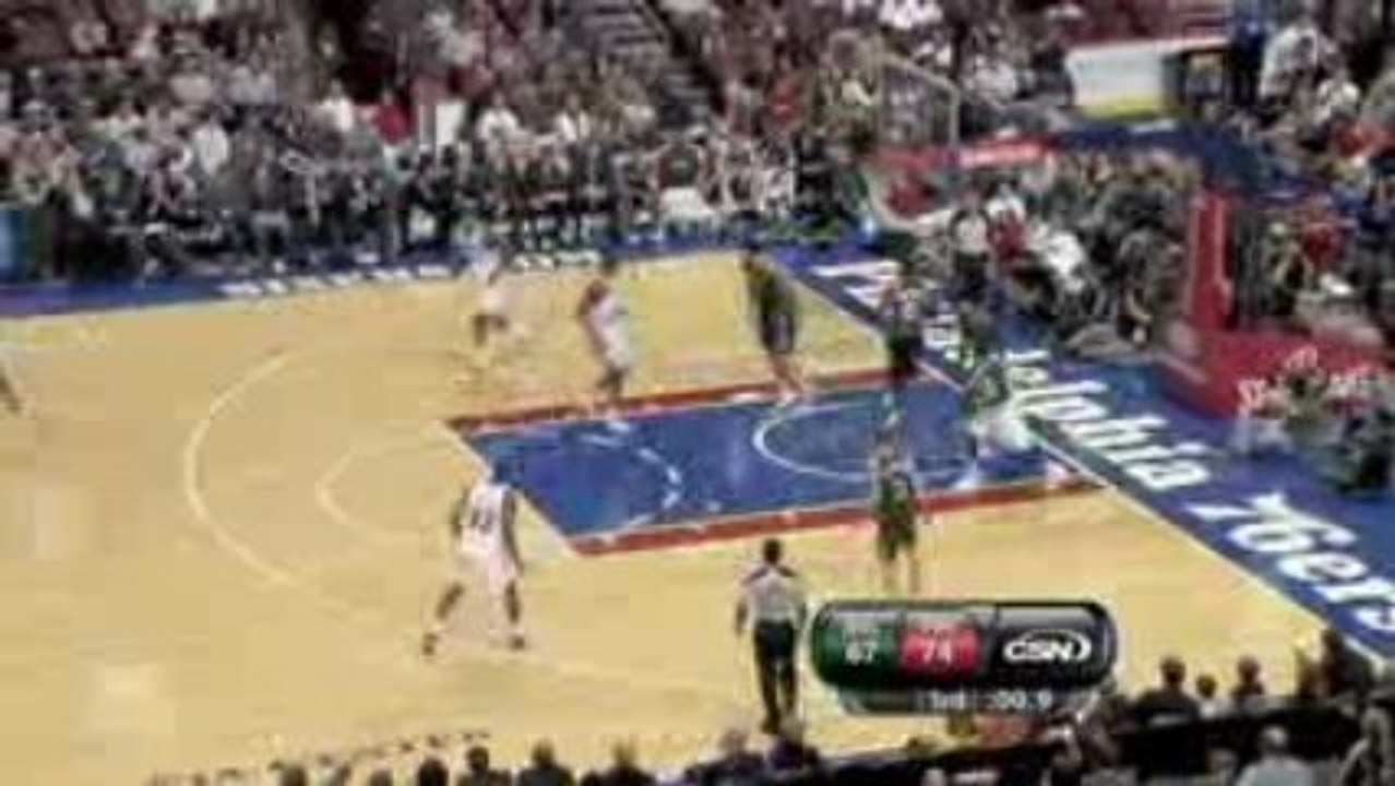 NBA Jrue Holiday scores his first basket as an...