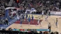 NBA Marcus Camby throws up a pretty reverse layup off the ni