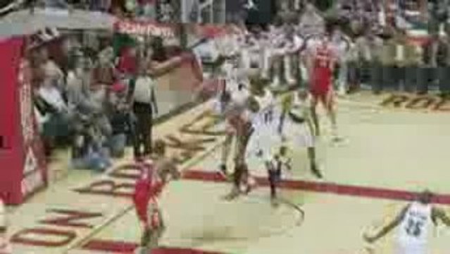 NBA Aaron Brooks drives the lane and tosses to Carl Landry i