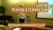 George playing a Stanley saw