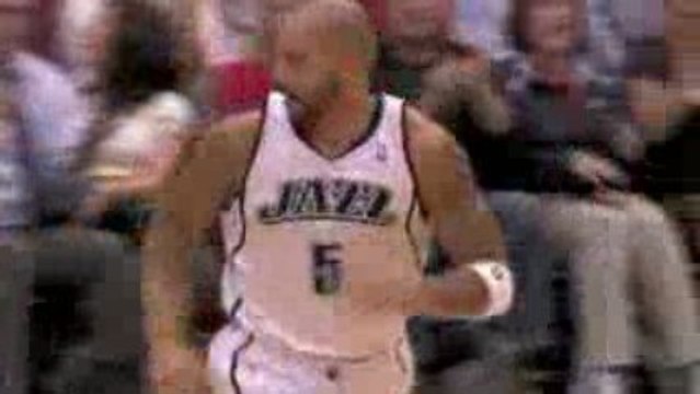 NBA Carlos Boozer scores 27 points and grabs 14 rebounds as