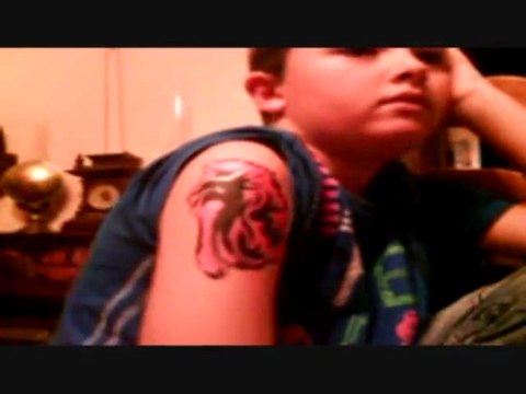 Tatouage improviser by Solitary Lion