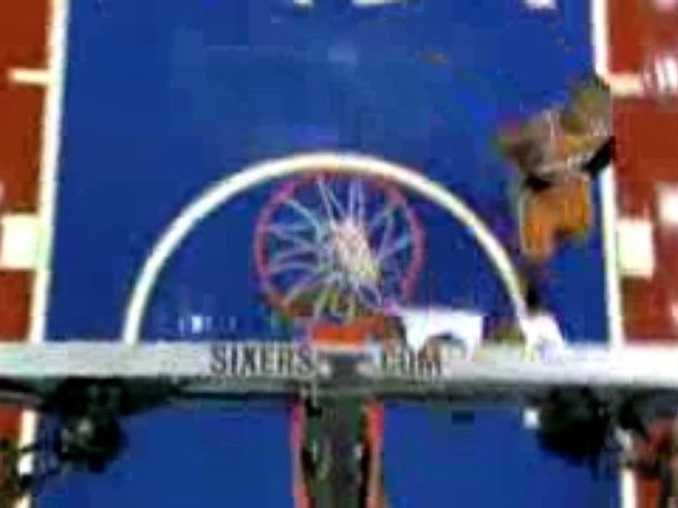 NBA Jrue Holiday dives on the floor and grabs the loose ball