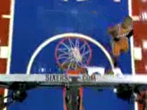 NBA Jrue Holiday dives on the floor and grabs the loose ball