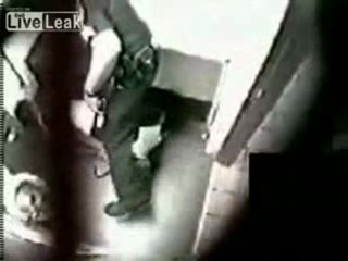 Foul- Cop Beats Down Unarmed Handcuffed Man [Raw Footage]