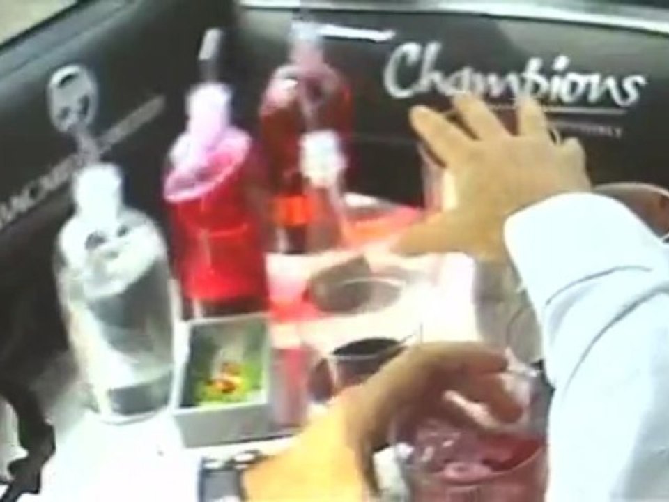 Mixing a cocktail as Schumacher drives