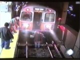 Woman Falls Onto Train Tracks, Survives