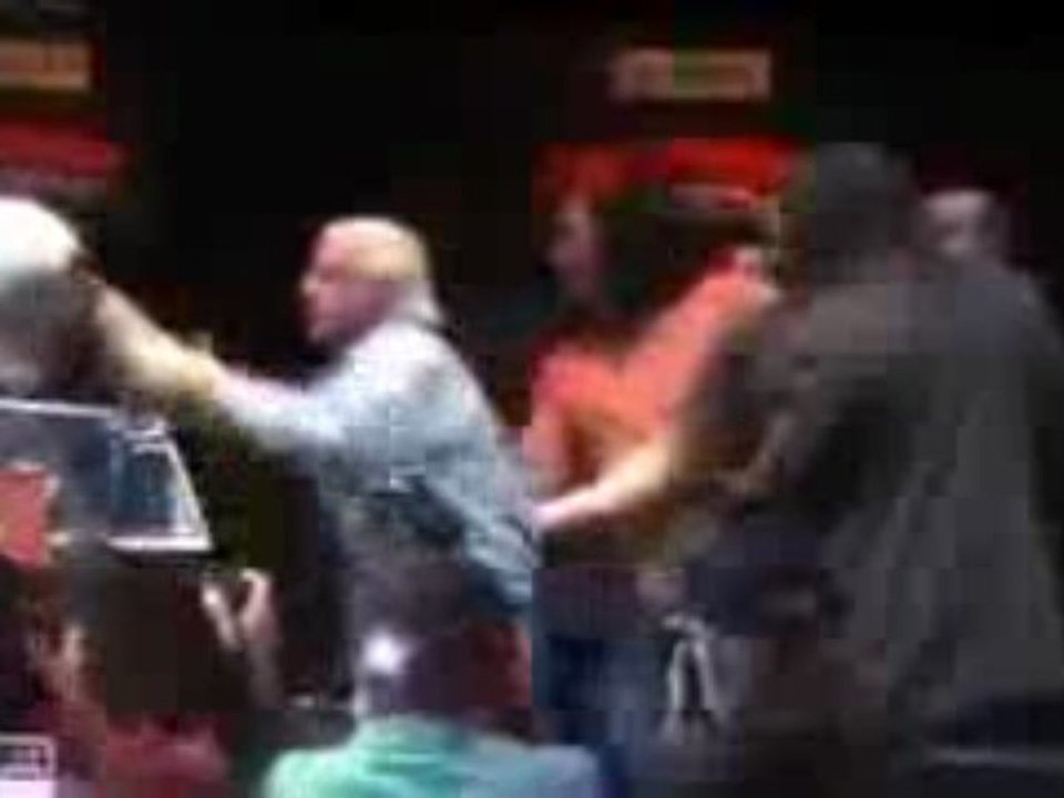 Hulk Hogan gets hit by Ric Flair during press conference