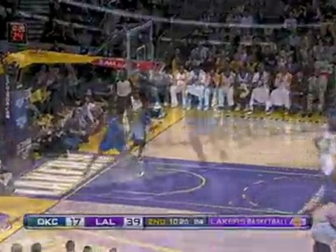 NBA Pau Gasol goes over the shoulder with a nice pass to Sha