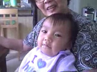 Lola Marlyn feeding A.J.