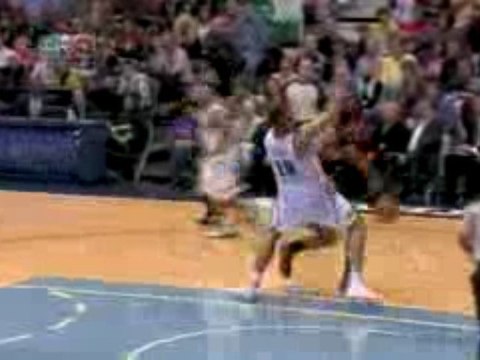 NBA Joakim Noah delivers a one- handed facial on Carlos Booz