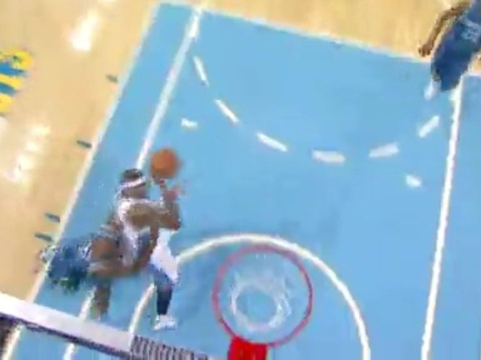 NBA Carmello Anthony somehow gets this shot to fall as he is