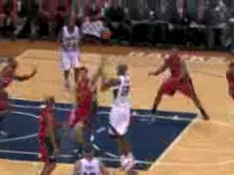 NBA Zaza Pachulia takes the nice pass down low and flushes i