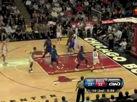 NBA Joakim Noah plows through the Pistons' defense for the s