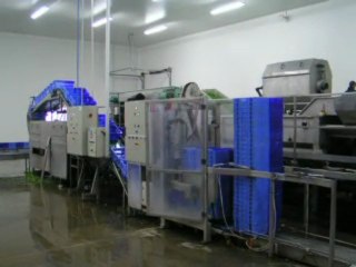 Ligne de lavage de caisse avec dépileur, retourneur, laveuse