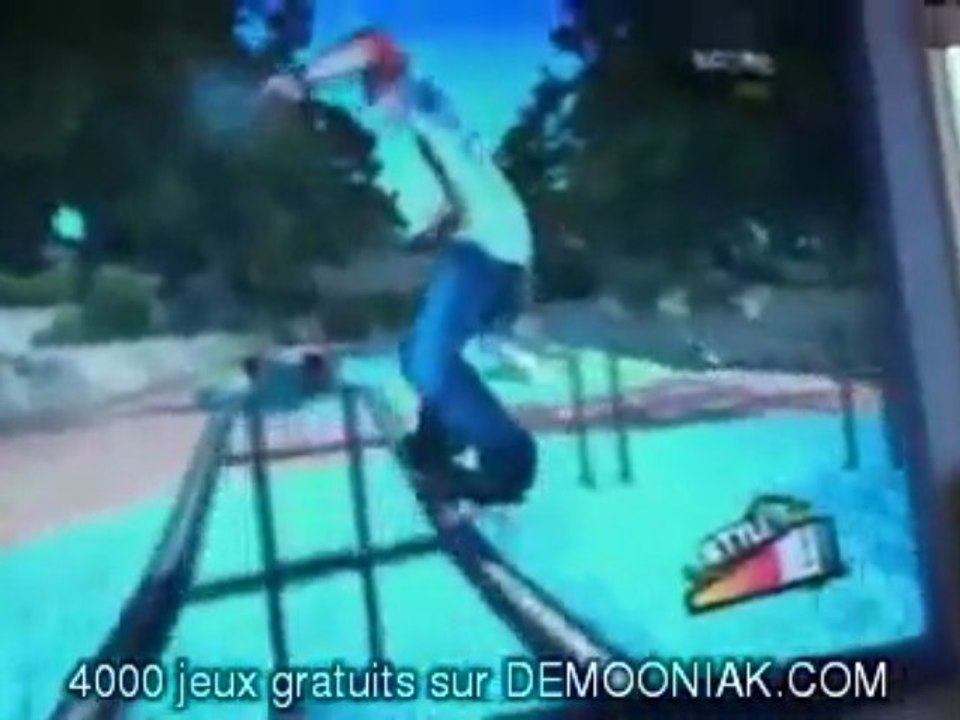 chien qui fait de la wii skateboard