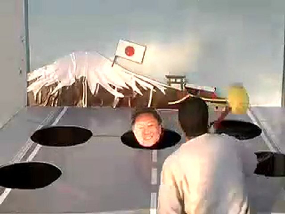 Sarkozy frappé par un marteau ( jeu sur Facebook)