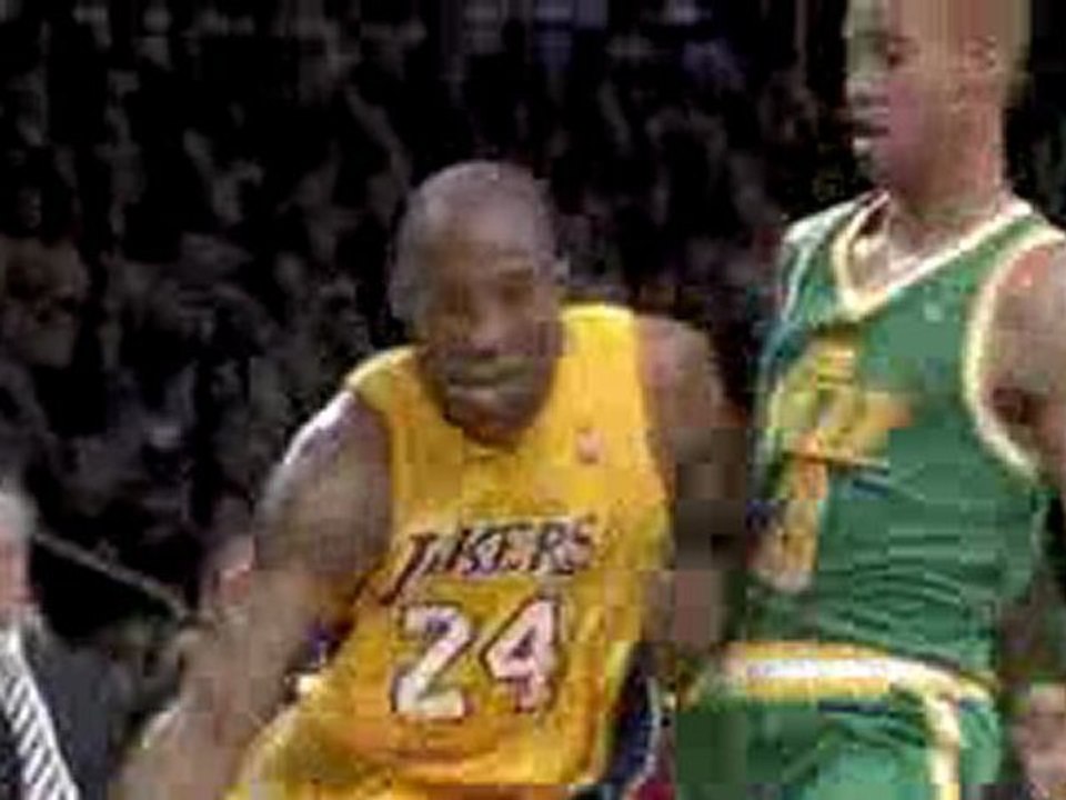 NBA Kobe hangs with it and gets the tough layup to fall.